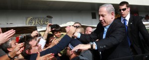 Israel's Prime Minister Benjamin Netanyahu seen shaking hands with Israeli citizens during a visit to the southern city of Ashdod, as Israelis go to vote in Israeli general elections for Israel's 19th parliament. January 22, 2013. Photo by Yossi Zamir/Flash90 Israel's Prime Minister Benjamin Netanyahu seen shaking hands with Israeli citizens during a visit to the southern city of Ashdod, as Israelis go to vote in Israeli general elections for Israel's 19th parliament. January 22, 2013. Photo by Yossi Zamir/Flash90