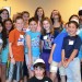 Recent HAT graduates participated in a special event aimed at keeping alumni connected to their Judaism and friends through a continuing education and social program. Back row: Daniel Krell, Rabbi Mordechai Wecker (head of school), Audrey Peck, Rose Lefcoe, Shelby Brown, Sanni Wagenaar, Emily Myers, Josh Schwarz, Sid Studebaker, and Evan Gordon. Middle row: Mariah Berkovich, Tia Einhorn, Meg Lederman, Rachael Stromberg, Leora Friedman, Sarah Blais, Jordan Familant, Micah Schachet-Briskin, and Elizabeth Hughes. Seated and standing in front: Jonathan Peck (seated), Sam Lederman (on right).