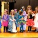 HAT and Strelitz preschool students join on stage in a parade of Purim costumes.