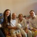 Zoya Shvartzman, Annie Sandler and Doron Goldstein, make a home visit (to the man in the center) in Bucharest.