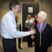 Dana Cohen is greeted by Craig Blackman.
