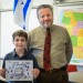 Leo Kamer, 2014 Poster Contest winner, with Harry Graber, UJFT executive vice president.