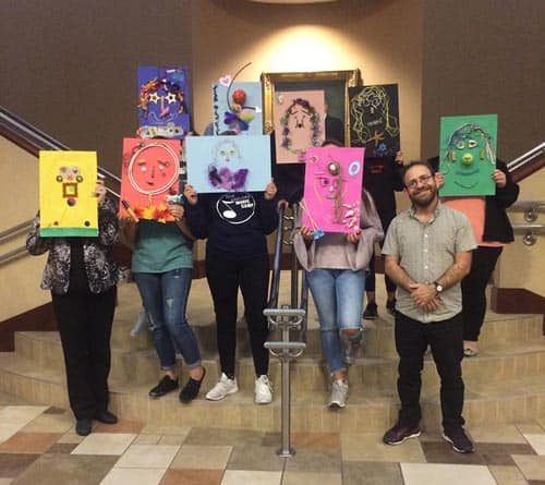 Ohef Sholom Temple’s Confirmation Class with their self-portraits.