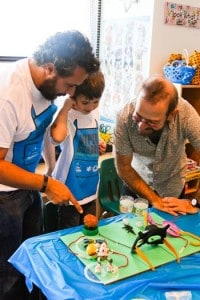 Eliot Weinstein, Avi Weinstein, and Hanoch Piven, Israel Today artist-in-residence.