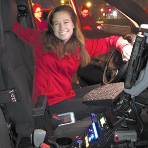 Jordan Ash Parker in a police car. Jordan Ash Parker in a police car.