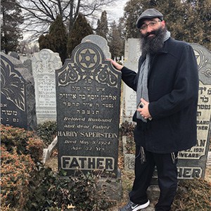 Jason Silverstein at the newly found resting place of his great grandfather. Jason Silverstein at the newly found resting place of his great grandfather.