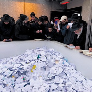 Praying at the Rebbe’s resting place alongside others of the thousands that visited that day. Praying at the Rebbe’s resting place alongside others of the thousands that visited that day.