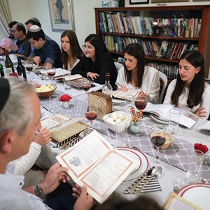 A family participates in the Passover seder. A family participates in the Passover seder.