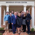 The Shenkman Jewish Center ribbon cutting ceremony with Rabbi Gershon Litt, student leaders, and Mark and Rosalind Shenkman.