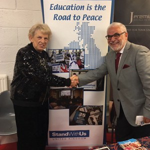 Joy Wolfe welcomes a Palestinian visitor to the StandWithUs UK stand at the 2017 International Shalom Festival held in Scotland during the Edinburgh Festival. Joy Wolfe welcomes a Palestinian visitor to the StandWithUs UK stand at the 2017 International Shalom Festival held in Scotland during the Edinburgh Festival.