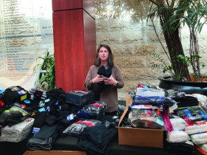 Robyn Bailey packs socks to be sent to Israel.